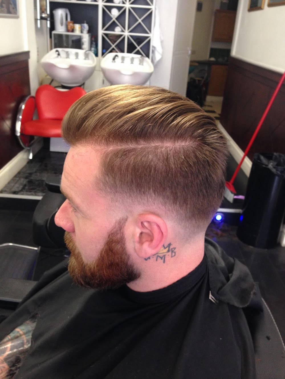 Inside Ali’s Turkish Barber Shop, Aungier Street — a skin fade and beard, with the shop sinks and chairs behind